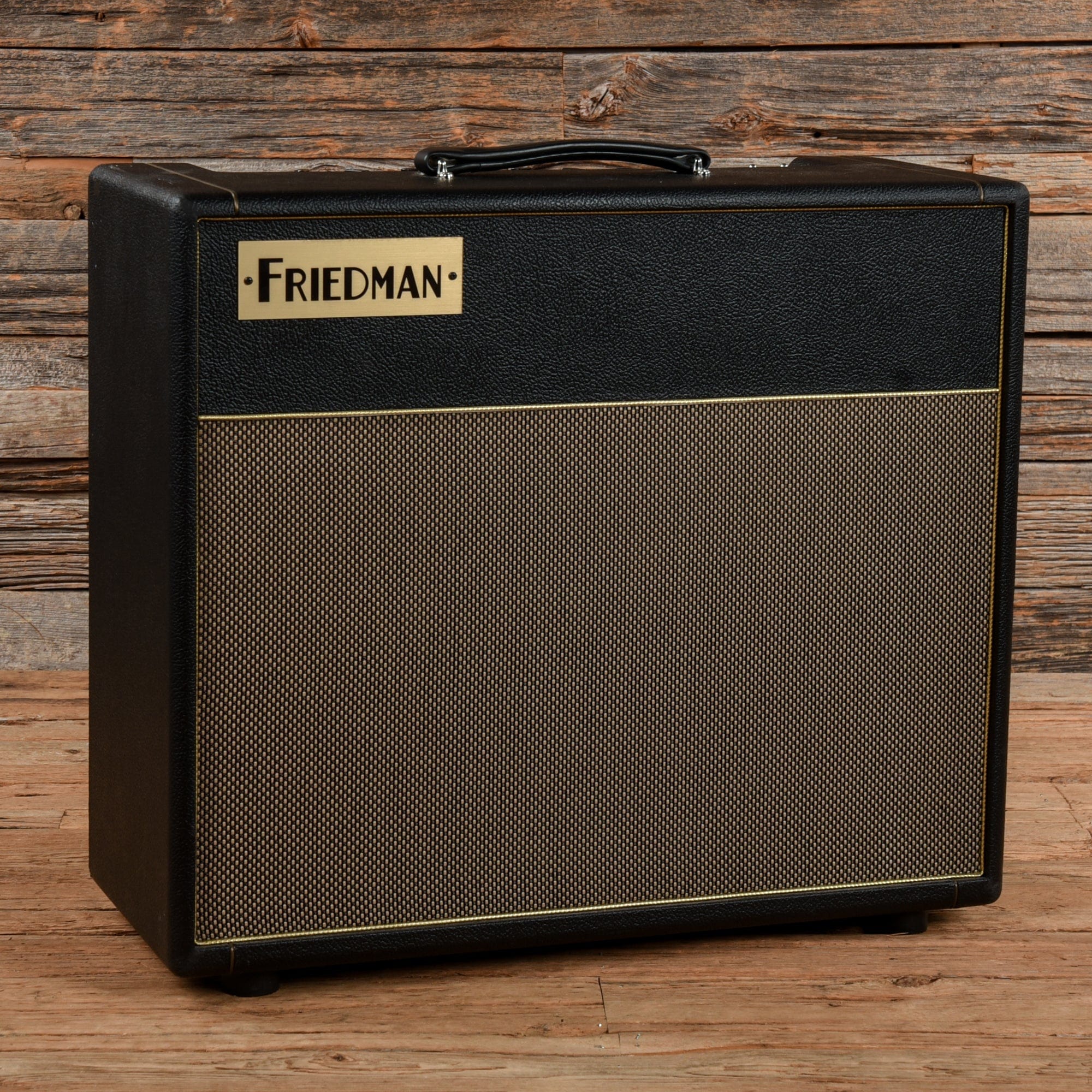 https://www.chicagomusicexchange.com/cdn/shop/files/friedman-amps-guitar-cabinets-friedman-wildwood-smallbox-50-combo-u5236066701-30787660644487_2000x.jpg?v=1700019303